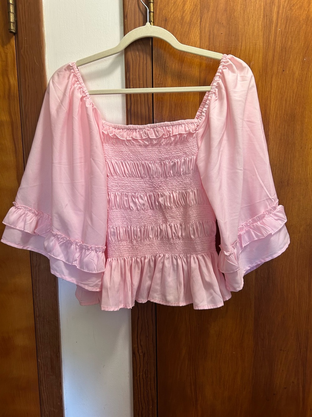Smocked Pink Peasant Blouse with Ruffle Hem